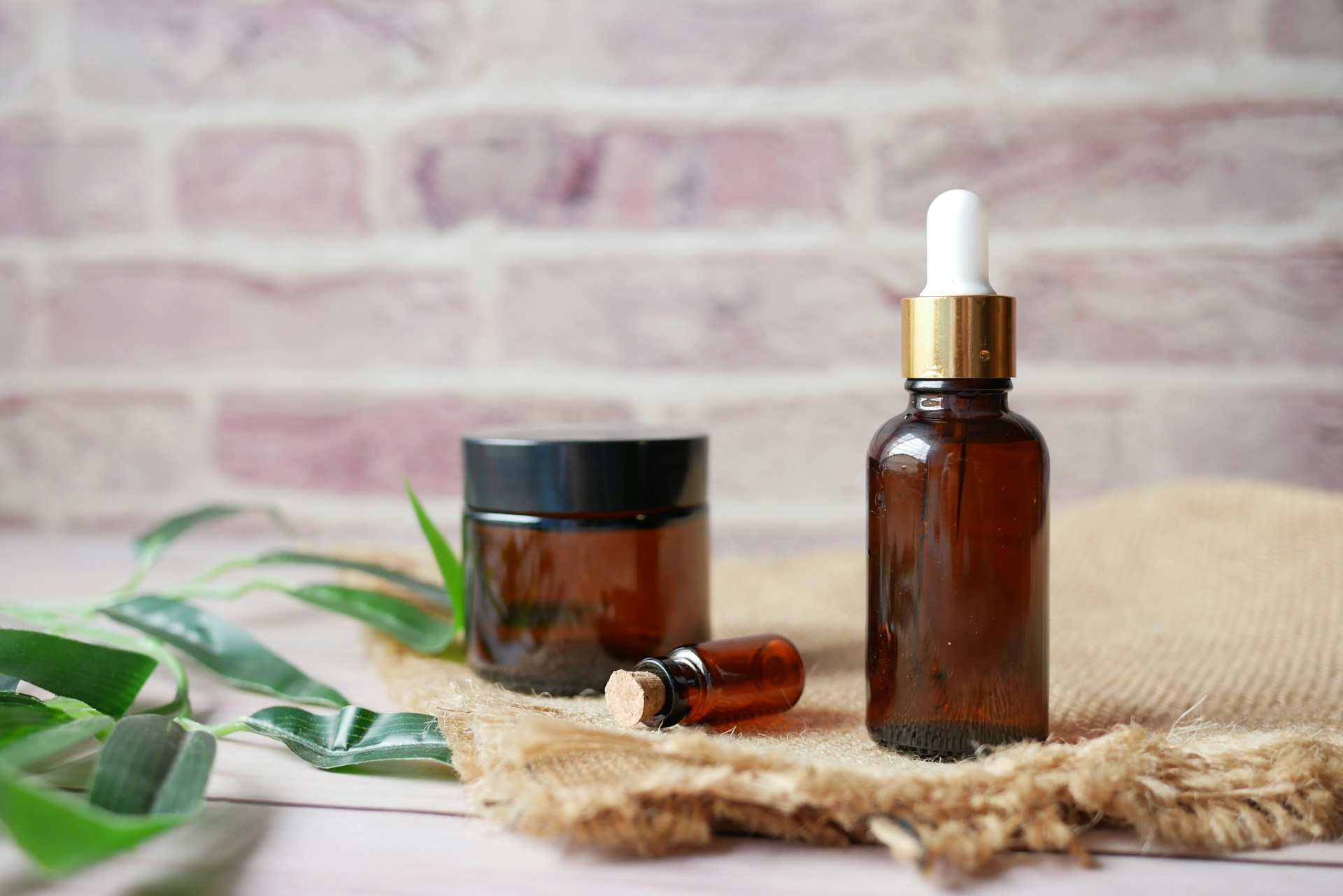 Natural skincare products with essential oil bottles